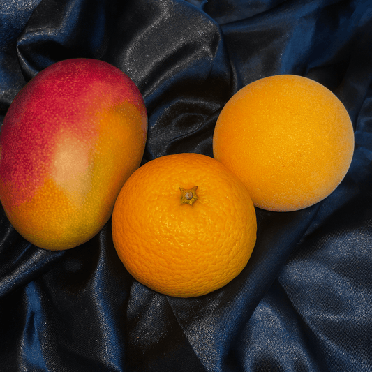 Bombe de bain fluorescente au parfum de Mangue-Agrumes.